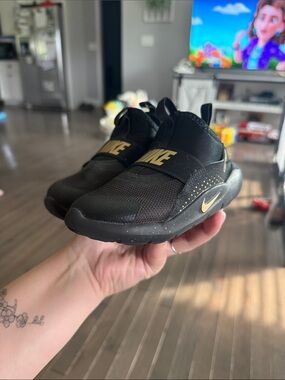 Nike Kids Black and Gold Slip-On Sneakers